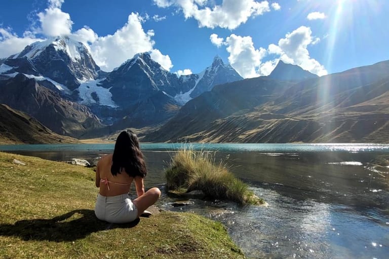 Laguna Jahuacocha Peru, turquoise lake below the Yerupajá and Jirishanca peaks in the Cordillera Huayhuash